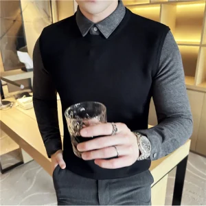 The collar of a dark pinstripe corduroy textured flannel shirt.Men's Sweaters with a Sewn-in Shirt Collar and a Layered Style