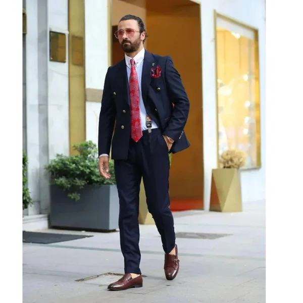 Smart casual business two-piece jacket and pants set in an elegant navy blue suit with a double breasted peak lapel and a flat front. - Image 3