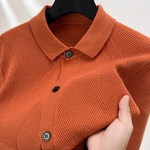Warm long-sleeved turn-down collar cardigan for men, stretchable sweater in a solid color, premium knitwear for everyday casual wear.